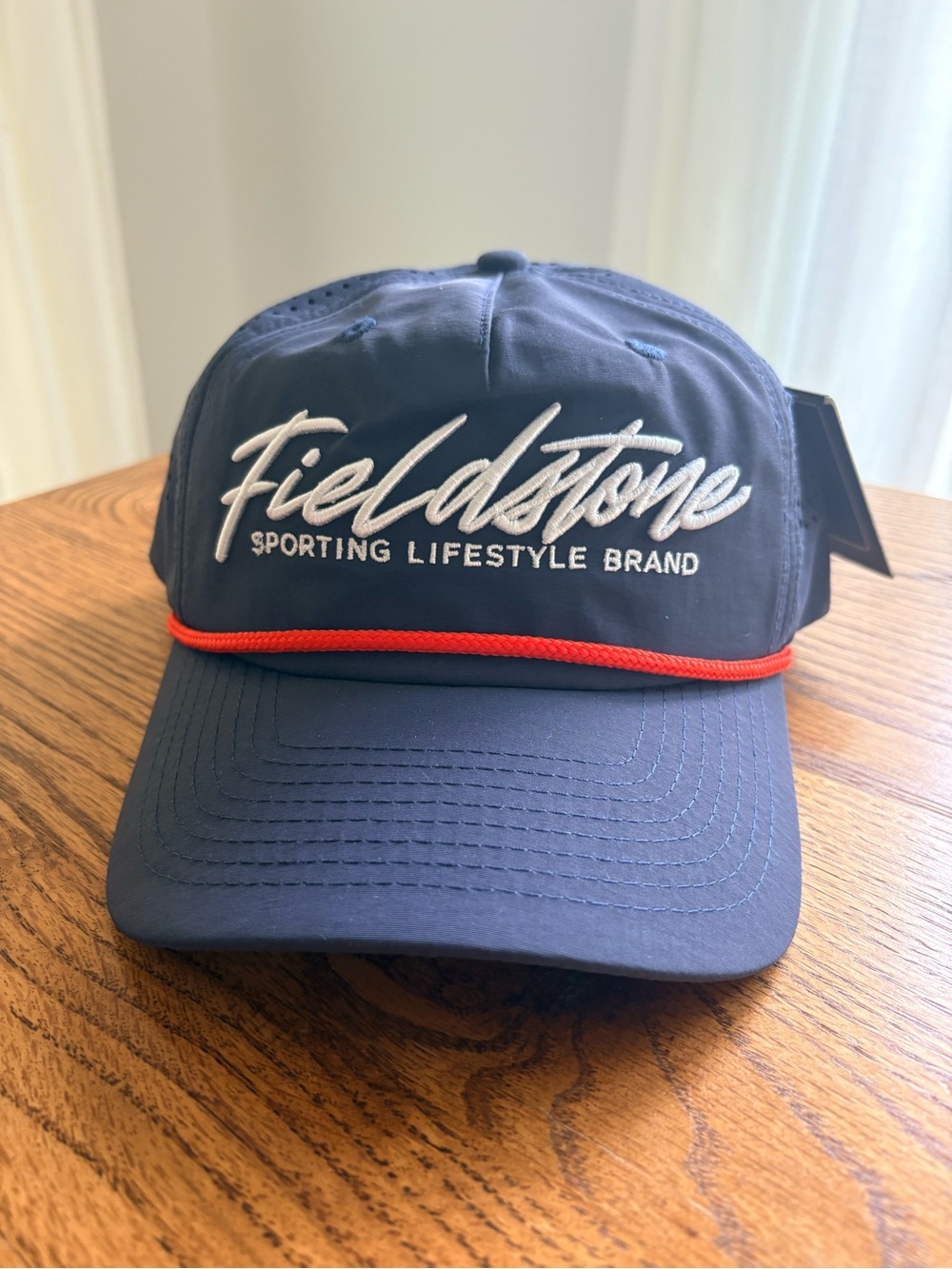 New with tags Fieldstone Navy hat with Red Accent - mens- SnapBack